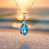 Goccia di Luce – Collana con zircone blu e finitura argentata